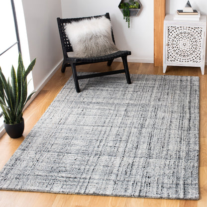 SAFAVIEH Handmade Abstract Coraly Modern Viscose Rug