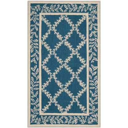 SAFAVIEH Handmade Chelsea Sunstripe Trellis French Country Wool Rug