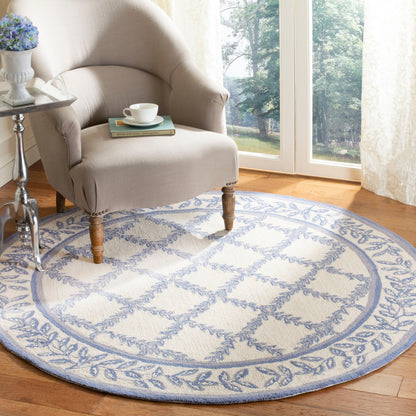 SAFAVIEH Handmade Chelsea Sunstripe Trellis French Country Wool Rug