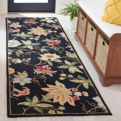 SAFAVIEH Handmade Chelsea Yauhenia French Country Floral Wool Rug