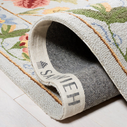 SAFAVIEH Handmade Chelsea Yauhenia French Country Floral Wool Rug