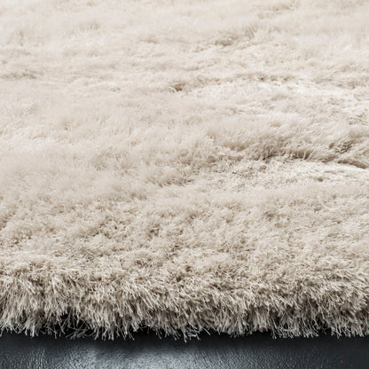 SAFAVIEH Handmade Fiona Shag Djenka 3-inch Thick Rug