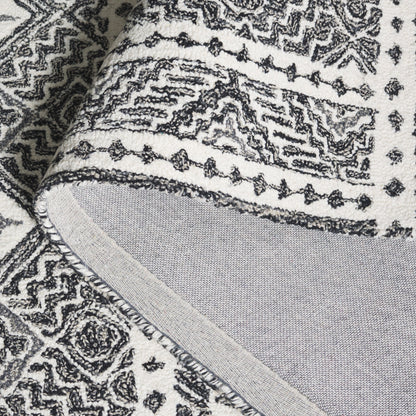 SAFAVIEH Handmade Micro-Loop Lutetia Wool Rug