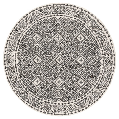 SAFAVIEH Handmade Micro-Loop Lutetia Wool Rug