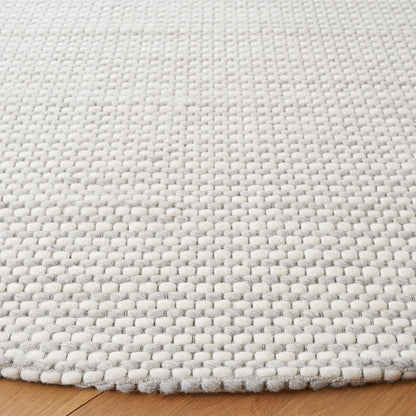 SAFAVIEH Handmade Natura Gerrita Wool Area Rug