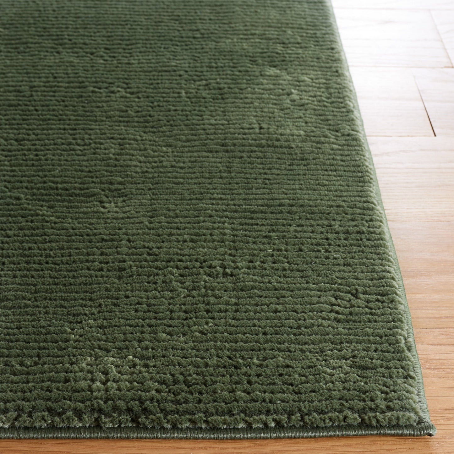 SAFAVIEH Revive Avie Solid Rug